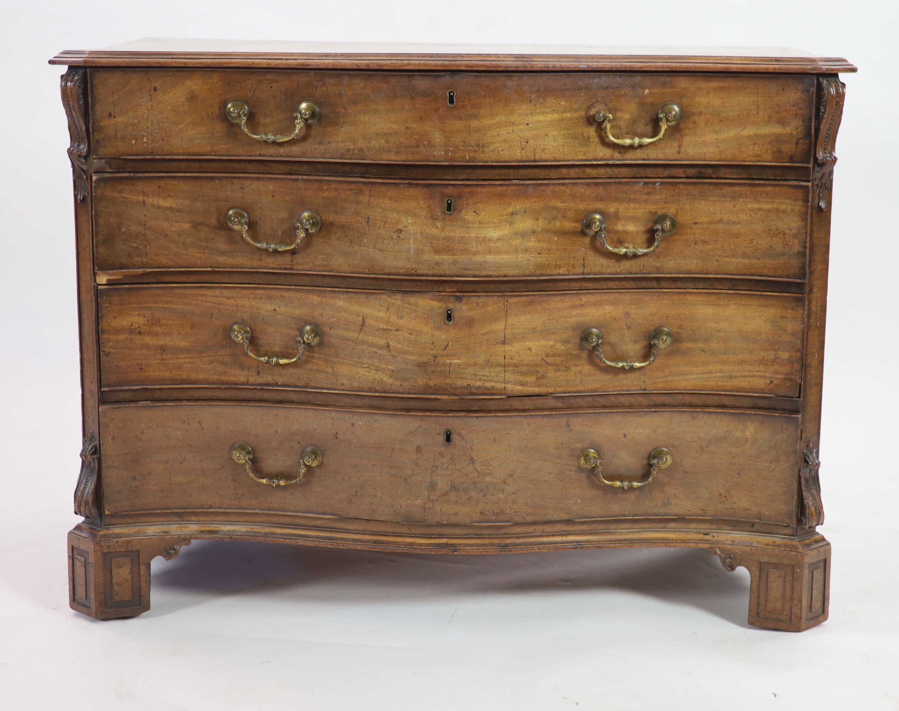 A George III Chippendale style mahogany serpentine commode W 112cm D 62cm H 83cm